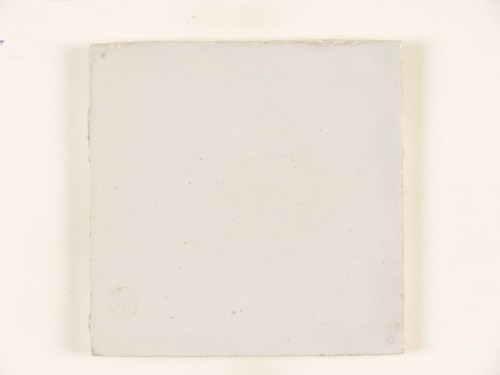 Tegeltableau, incompleet, met een blauwwit decor van een kustlandschap