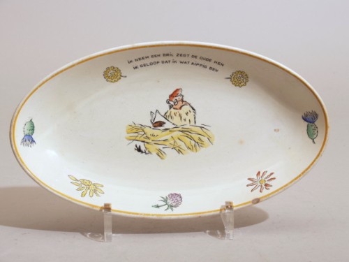 Ontbijtservies met polychroom decor, decor de familie kakelbont