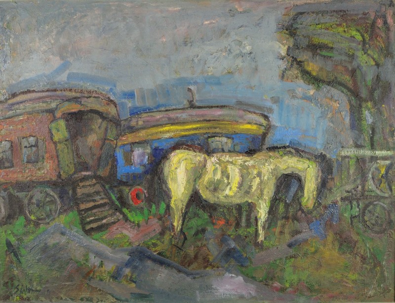 Woonwagens en geel paard