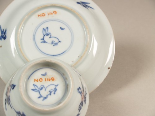 Kop en schotel met decor van vogels en ranken
