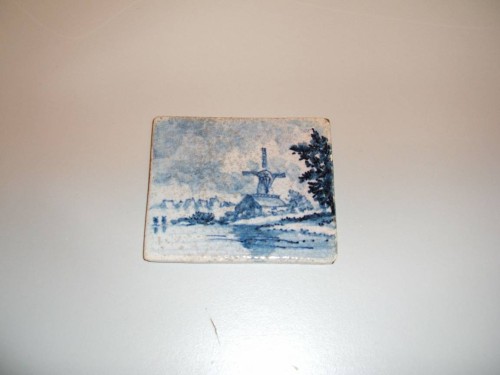 Tegel met waterlandschap