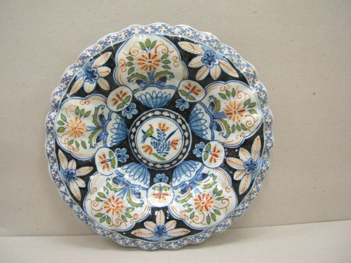 Plooischotel met ornamentaal-floraal decor