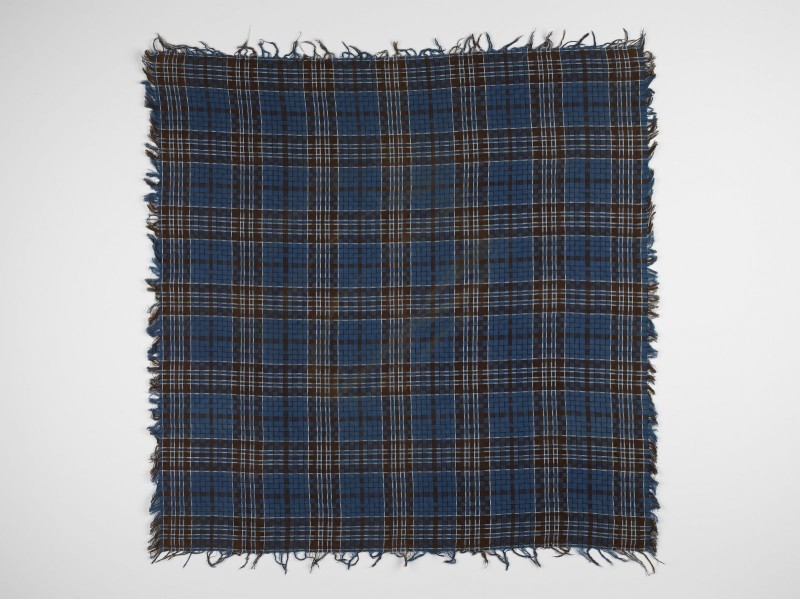 Doek of sjaaltje met ingeweven ruitpatroon in keperbinding